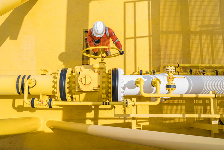 Industrial Technician turning valve