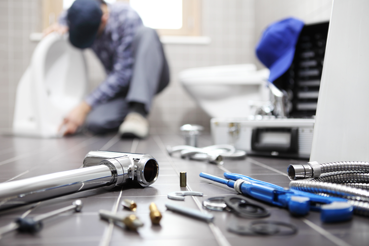 Plumbing Plumber fixing sink